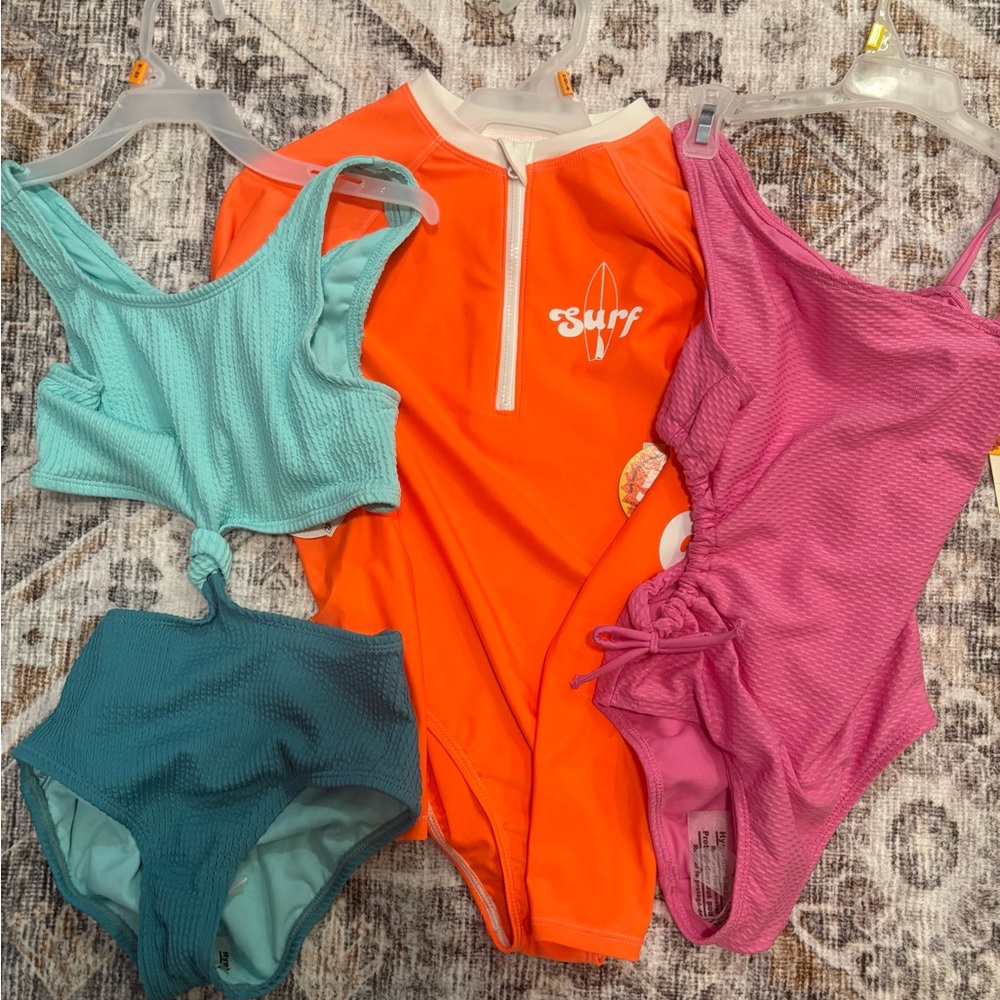 George girls medium 7/8 swimsuits. New with tags
